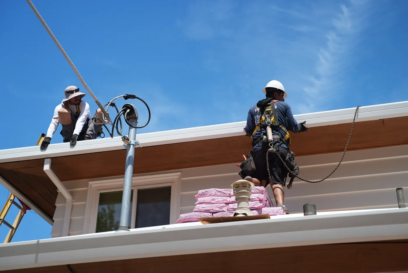 A Straight Line roofer completing a roof repair
