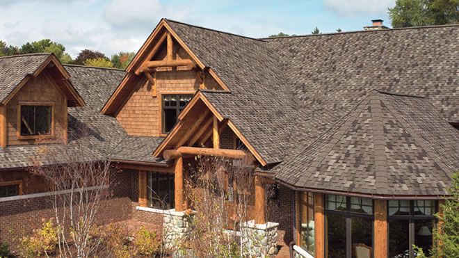 a new shingle roof on beautiful log home in California.
