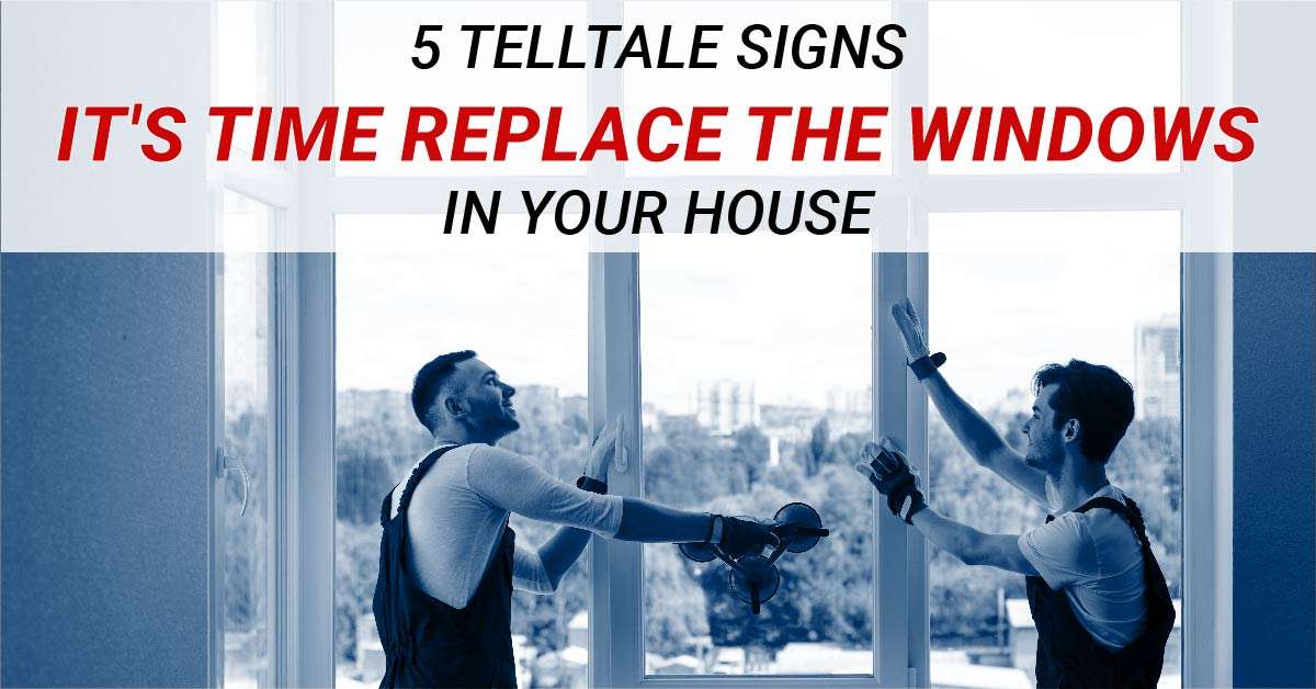 two men installing a window with the caption "5 Telltale Signs It's Time Replace The Windows In Your House"