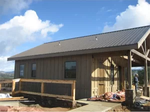 New metal roof installation on residential property in shingle springs