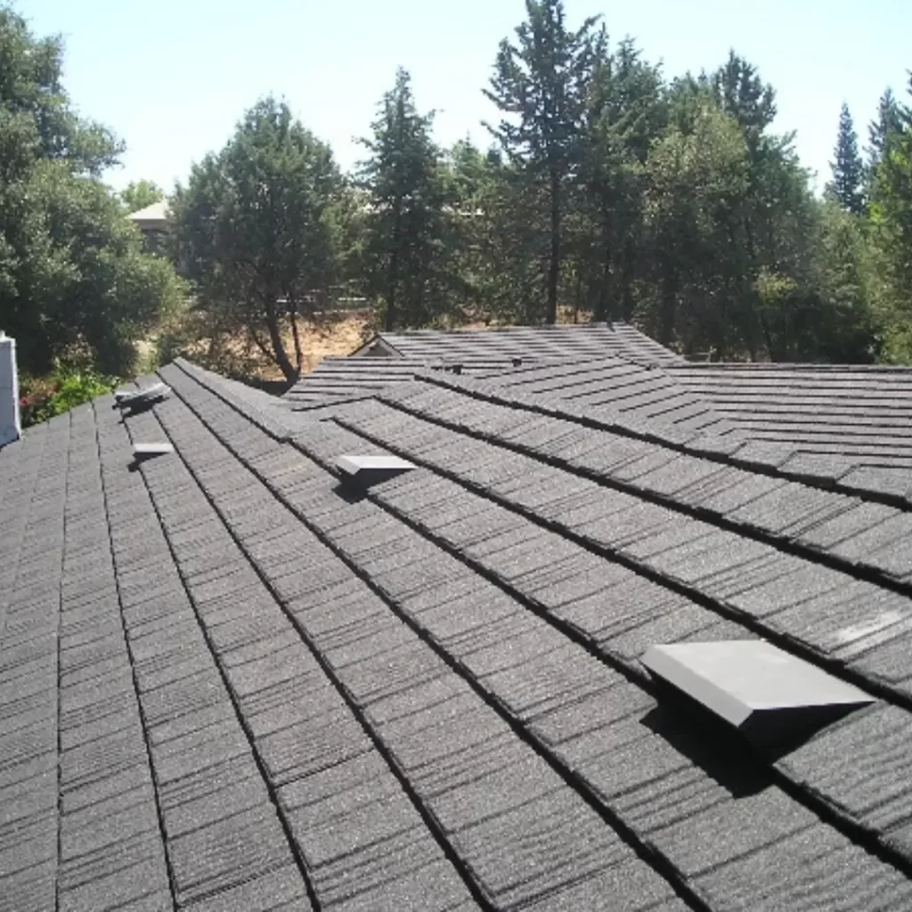 Up close new asphalt roof.