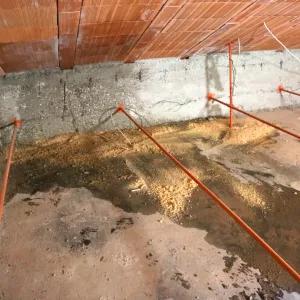 Moisture damage inside an attic.